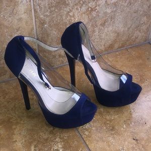 Blue suede 6 inch pumps.